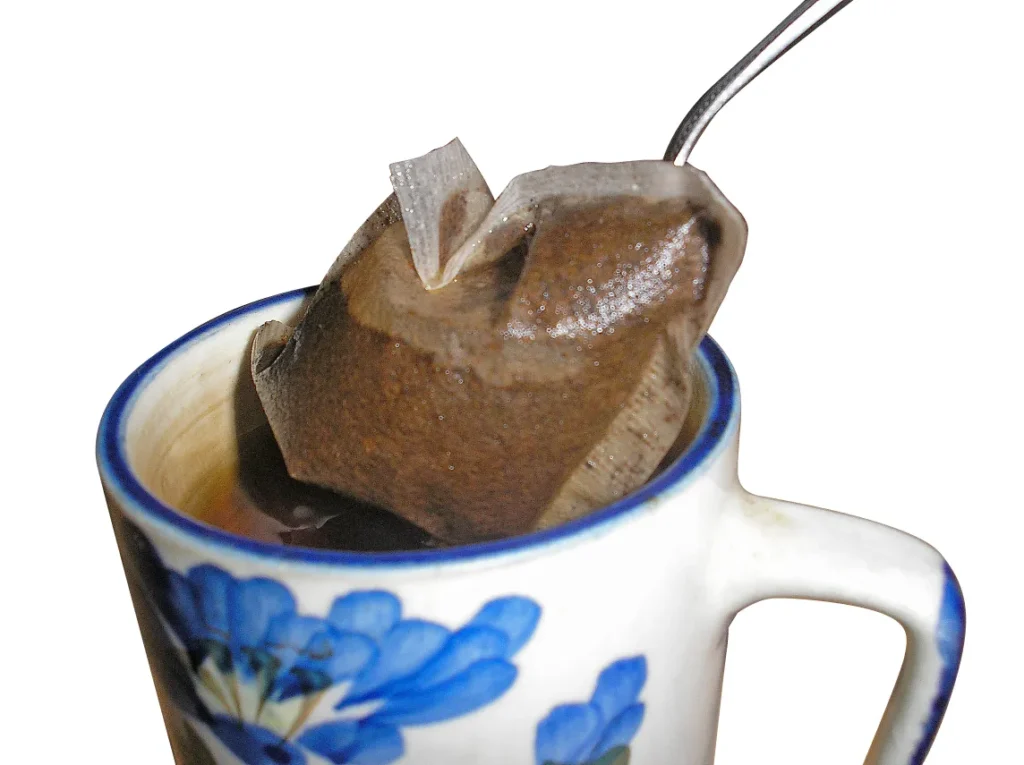 Tea bag steeping in a cup A tea bag steeping in a cup