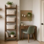 Small apartment corner with vertical storage: walnut ladder shelf with linen baskets, floating wall shelves, pegboard above a compact desk, and an over-the-door fabric pocket organizer